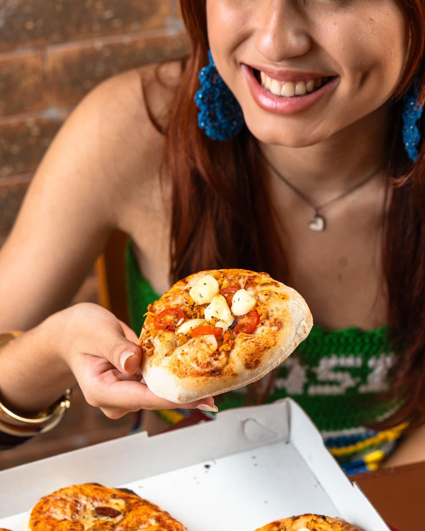 Pizzas artesanais da Bendita na caixa de delivery